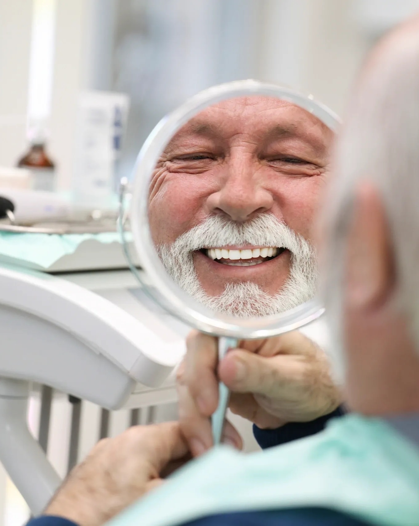 Patient with a confident smile after dental implant treatment